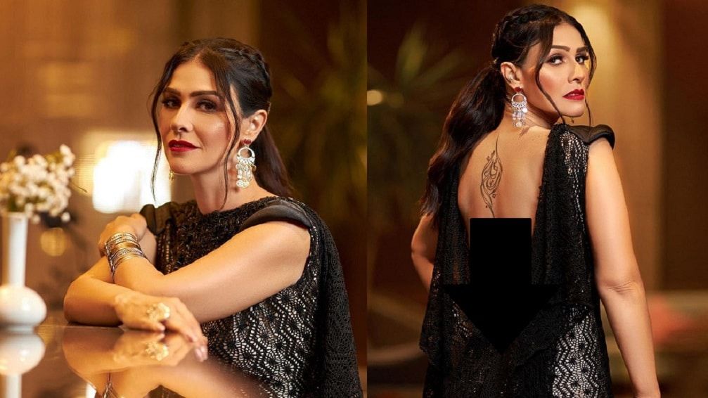 بسمة تتألق في جلسة تصوير في "حمام سباحة" (صور)