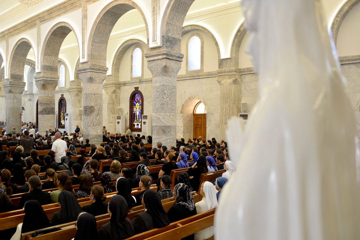 قداس على أرواح ضحايا حريق الحمدانية (صور)