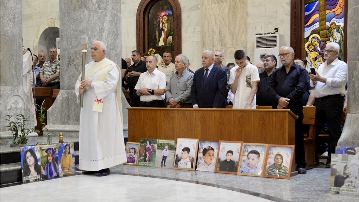 قداس على أرواح ضحايا حريق الحمدانية (صور)