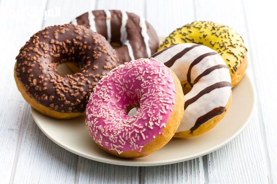 تحلية أطفال.. طريقة عمل الدونات الهشة خفيفة ومحشية