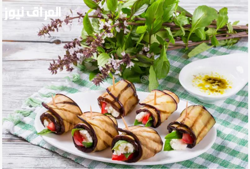 باذنجان بطعم مفاجئ.. عمل لفائف الباذنجان بحشوة الفيتا بطعم غير متوقّع